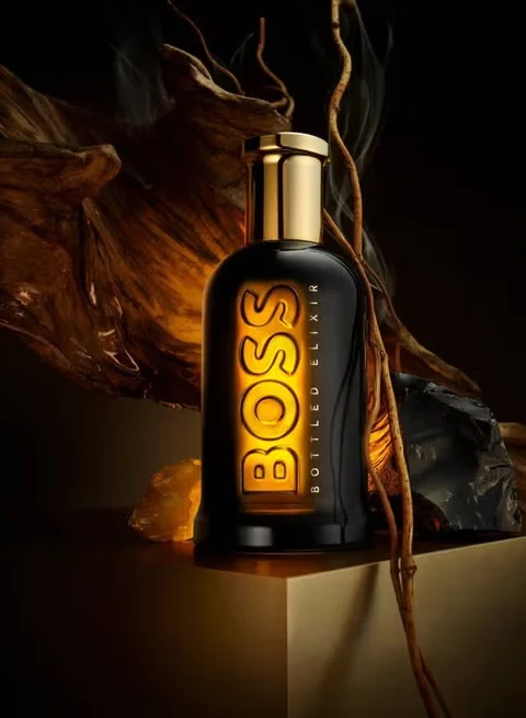 Hugo Boss Bottled Elixir in a dark bottle with gold details